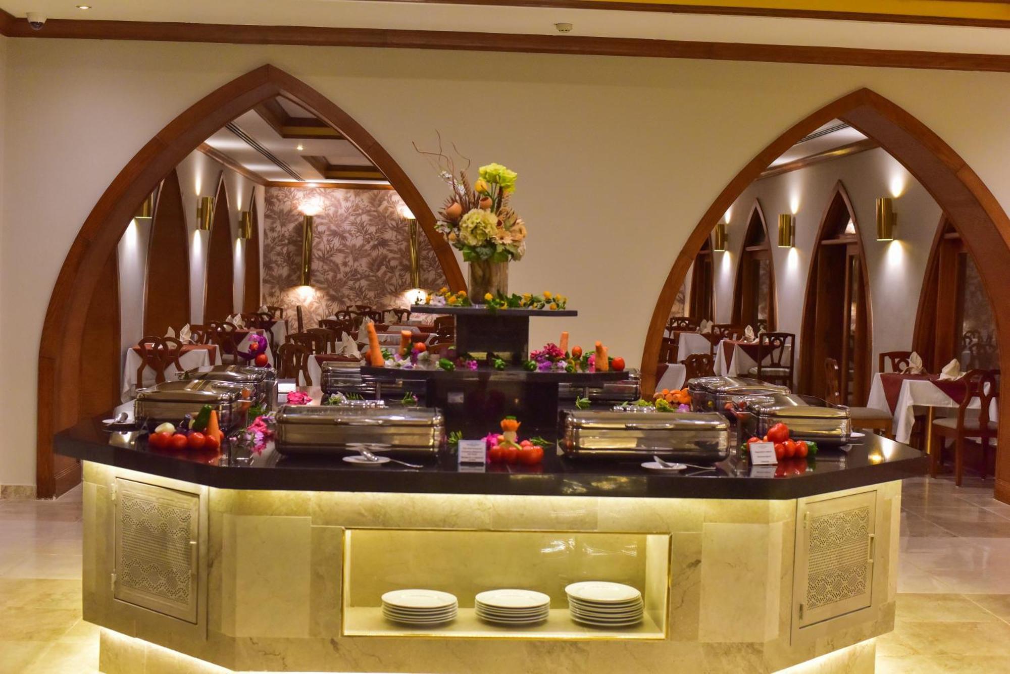 The Grand Hotel Sharm El Sheikh Екстериор снимка A buffet at a hotel