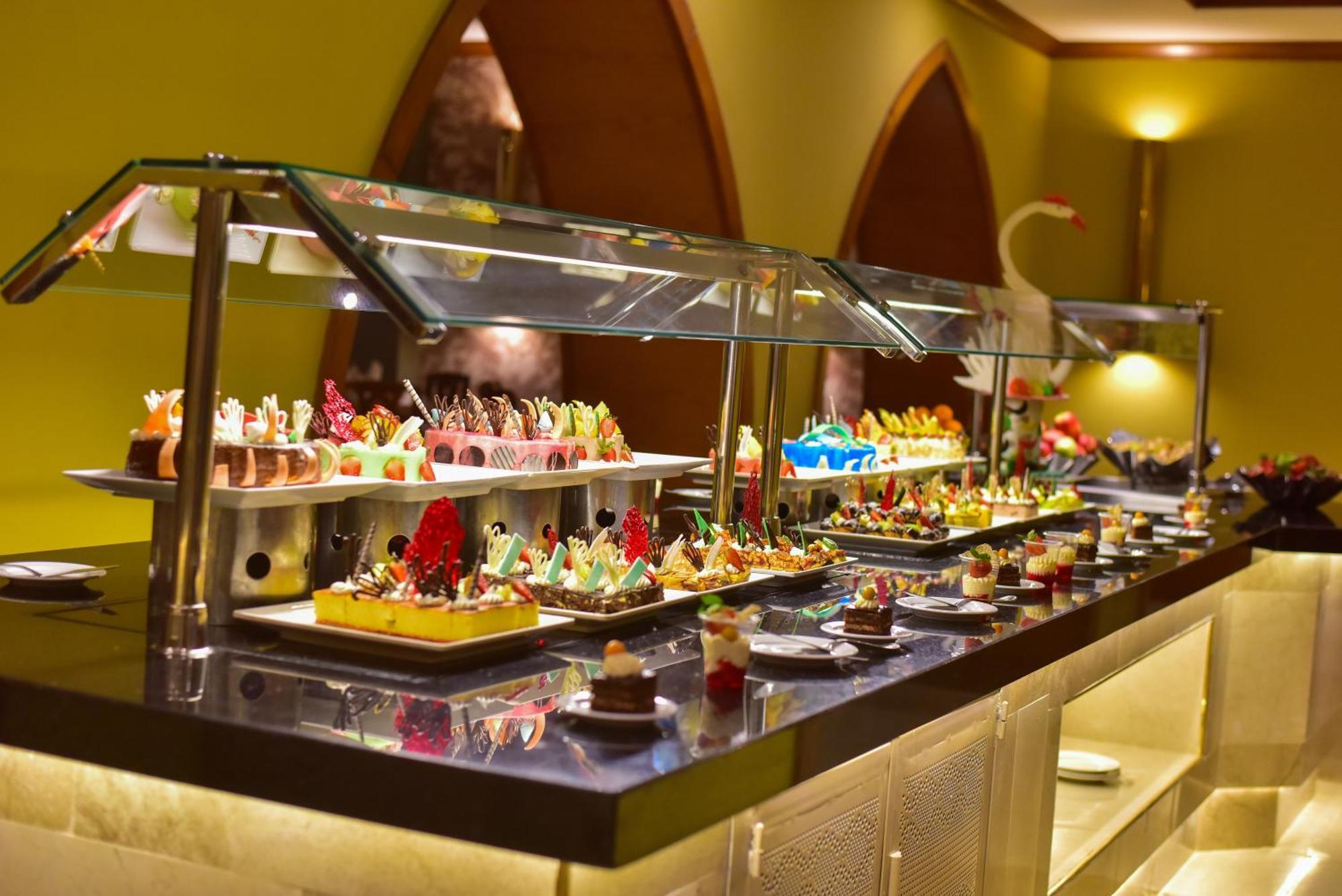 The Grand Hotel Sharm El Sheikh Екстериор снимка A dessert buffet